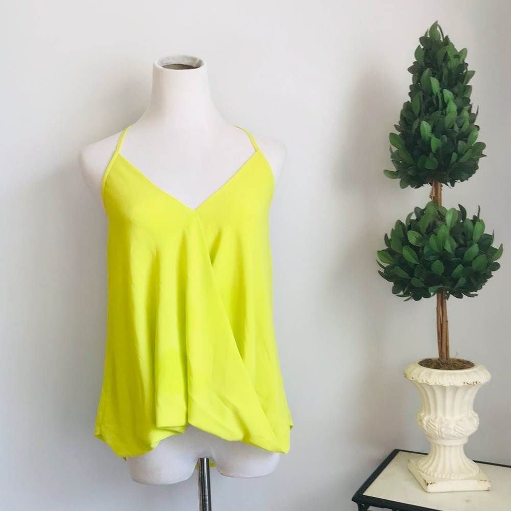 Vanilla sky Feminine and flowy woven tank top.